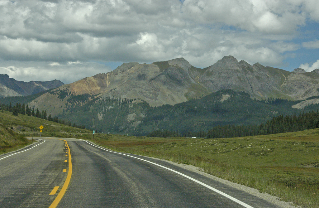 colorado road highway trip drive vacation travel rico mountain co rain clouds