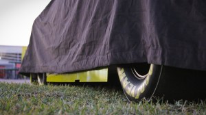 NASCAR race car under wraps at Daytona, travel